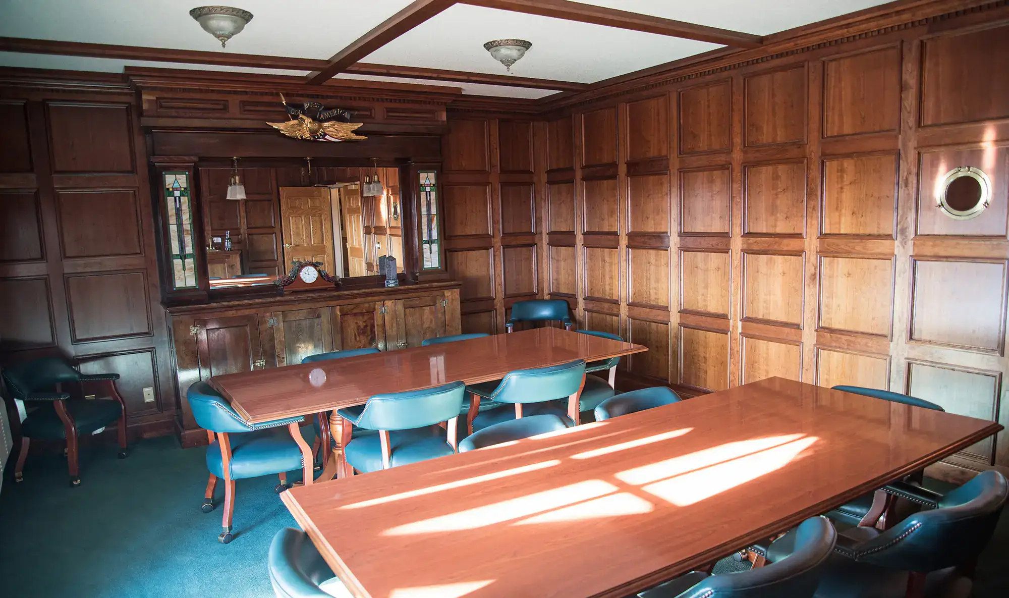 The Boardroom - an elegant wood-paneled meeting room