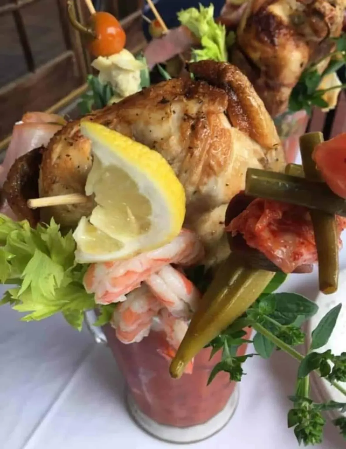 Godzilla Bloody Mary with a whole roasted chicken on top