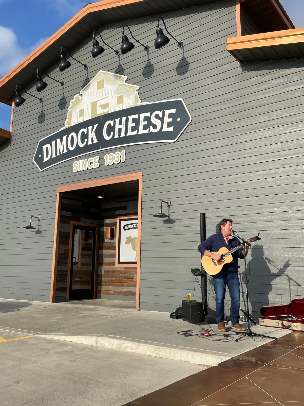 Paul Weidenbach performing outside at Dimock Cheese